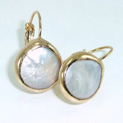 Pendientes retro dorados con piedra blanca