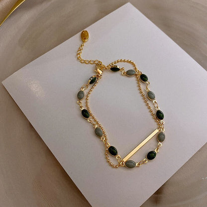Pulsera doble con charms