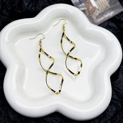 Pendientes Espiral Dorada | Oro