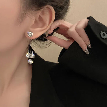 Pendientes Triade de circonita chapados en oro