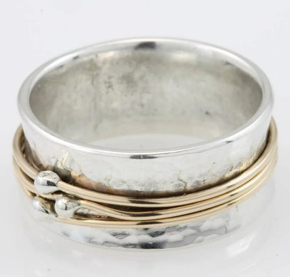 Anillo vintage dorado con capas plateadas
