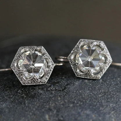 Pendientes redondos de cristal blanco