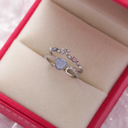 Anillo ajustable de piedra azul con circonita en plata de ley