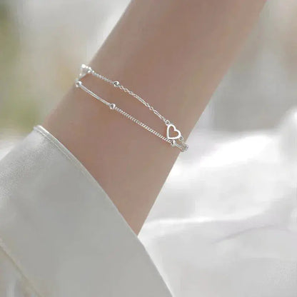 Pulsera ajustable de plata con corazón