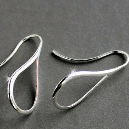 Pendientes vintage huecos con colgante