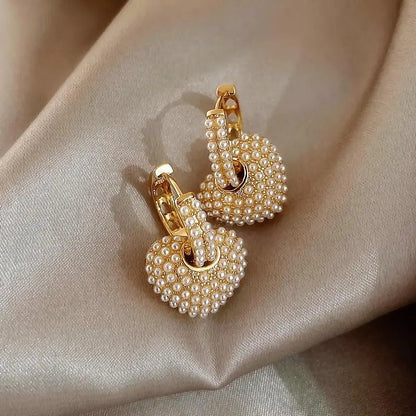 Pendientes de perlas del amor en oro
