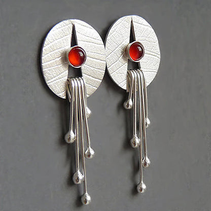 Pendientes colgantes con piedra roja hueca