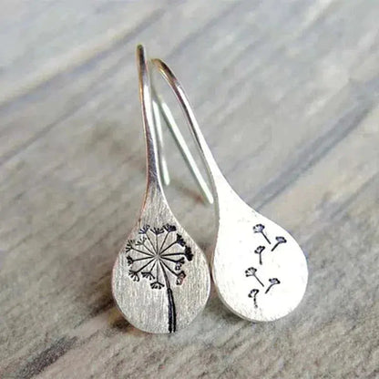 Pendientes de diente de león en plata