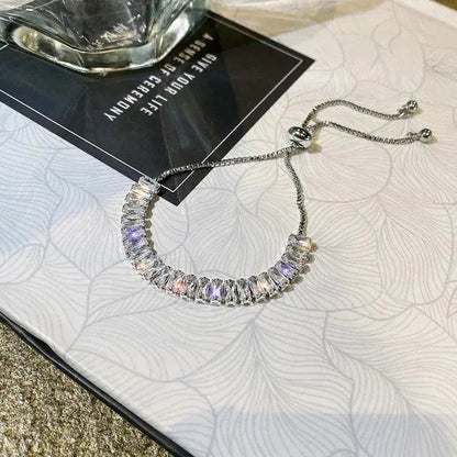 Pulsera ajustable de circonita cúbica en oro y plata