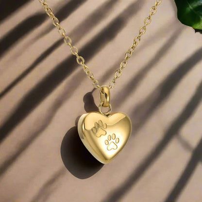 Collar con urna conmemorativa para mascotas – Colgante en forma de corazón con grabado de una pata