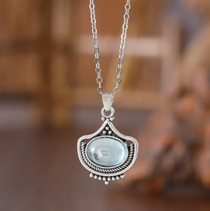 Conjunto vintage de collar y pendientes con piedras preciosas ovaladas azules