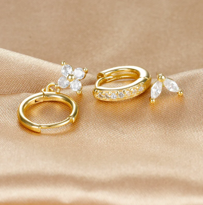 Conjunto de pendientes con diamantes en forma de flor