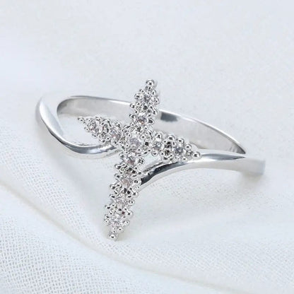 ANILLO CRUZ DE PLATA CUBIERTO DE CIRCONIO