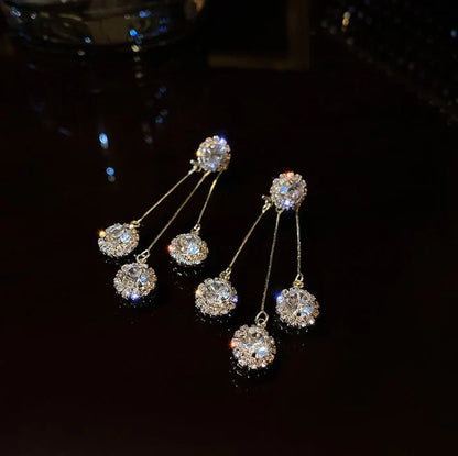 Pendientes Triade de circonita chapados en oro