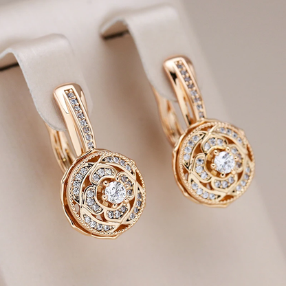 Elegantes pendientes redondos de circonita y oro