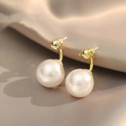 Pendientes con perlas doradas