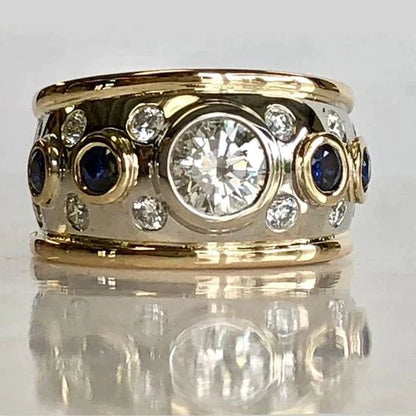 Anillo vintage con incrustaciones de circonita dorada
