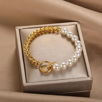 Pulsera elegante de oro y perlas