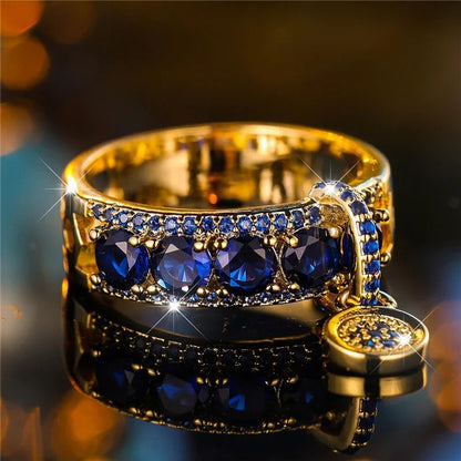 Anillo antiguo de oro y cristal azul