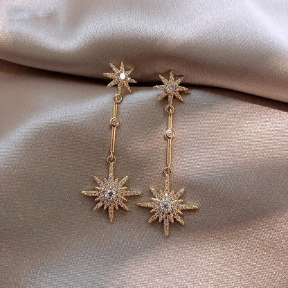 Pendientes vintage de oro con estrella de cristal